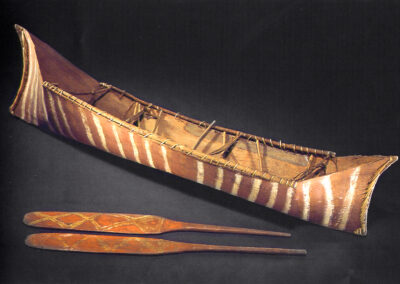 Model canoe & 2 oars, Macleay Museum, University of Sydney